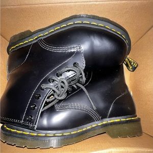 all black dr martens boot. smooth.